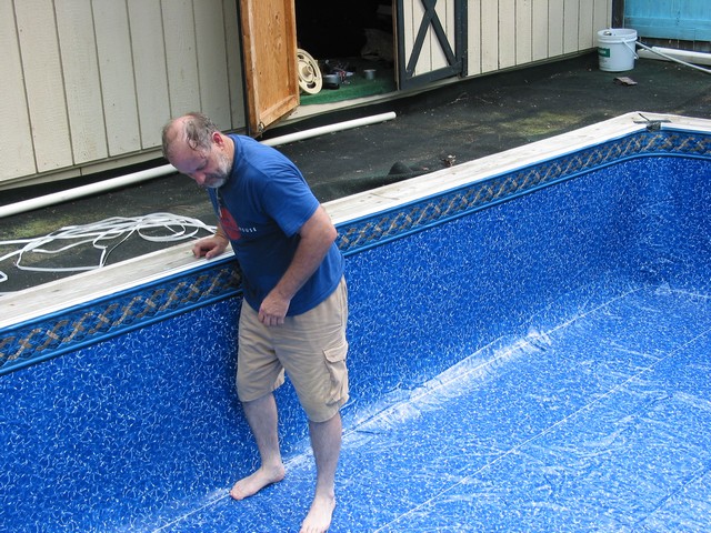 Pulling it to the side to straighten the bottom wrinkles Note I have no socks. Need the friction now.