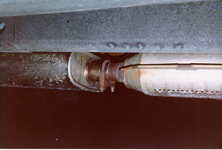 center part of the muffler on the CAT it will not slide in all the way